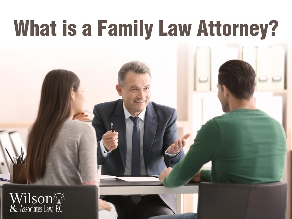 A couple talking to a family law attorney