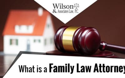 Photo of a toy house with a gavel next to it and the text: What is a Family Law Attorney?